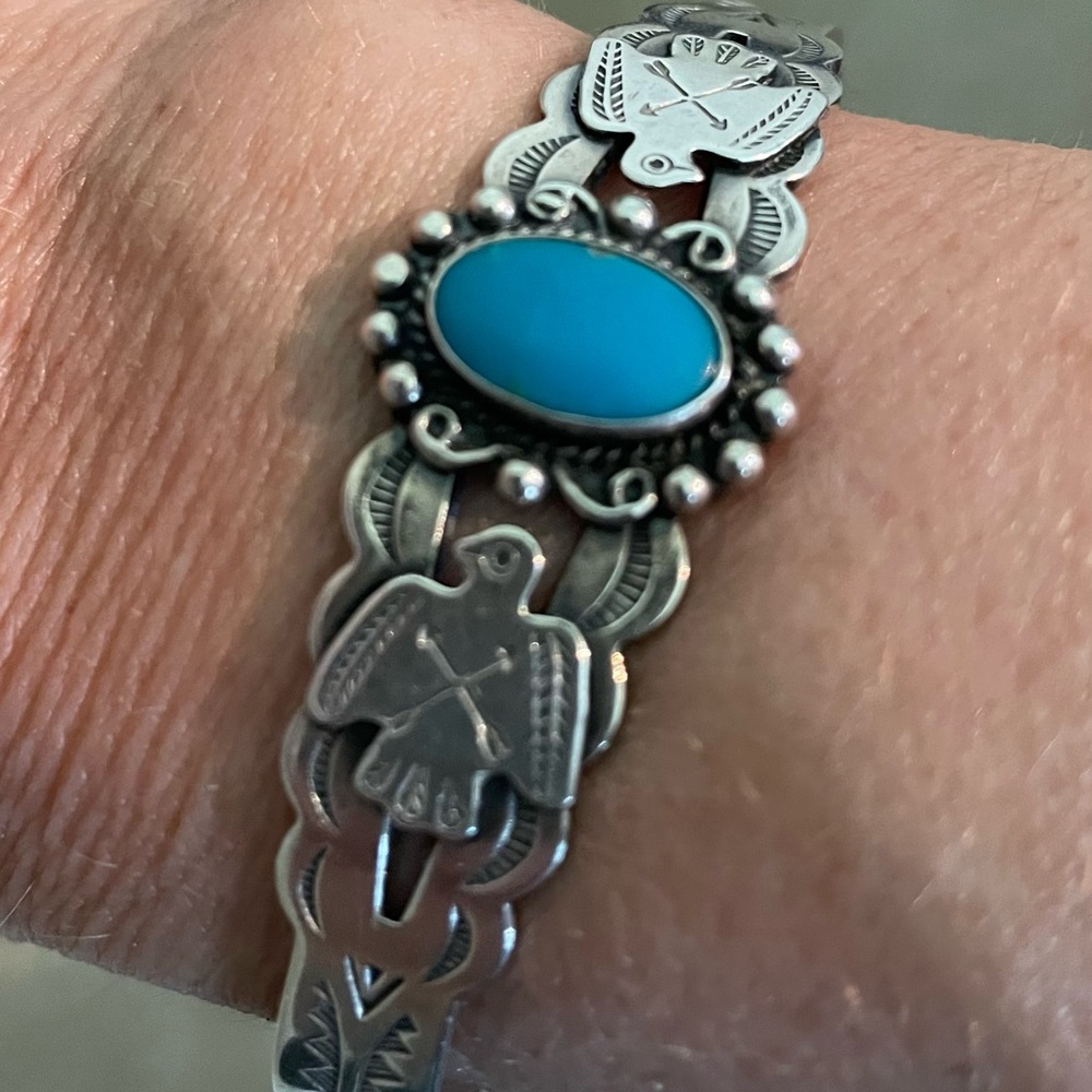 Silver cuff bracelet with blue stone